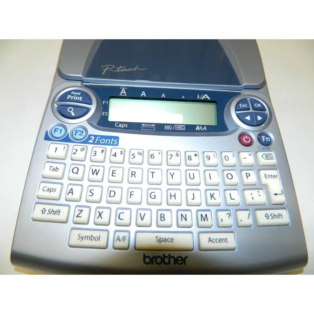 Brother P-Touch PT-1880 Label Maker With 12MM White Tape